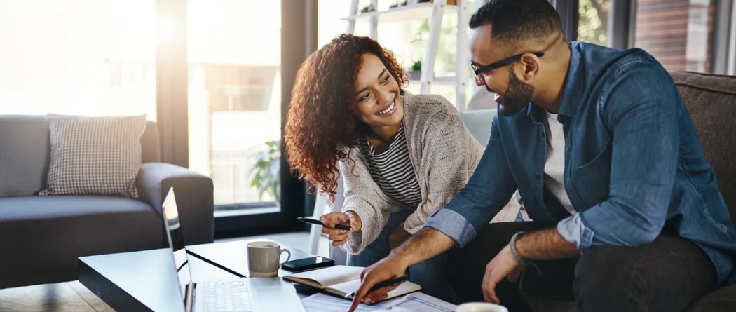a couple sitting reviewing their finances
