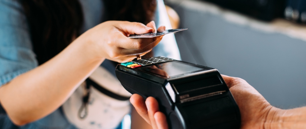 Credit card paying for purchase.